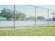 Community tennis court with chain-link fence at 5622 Sir Churchill Dr, Leesburg, FL 34748