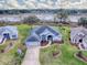 Aerial view of a house showcasing a beautiful lake view at 5626 Squires Dr, Leesburg, FL 34748
