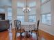 Charming breakfast nook with round table and chairs, bathed in natural light at 5626 Squires Dr, Leesburg, FL 34748
