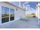 Relaxing screened patio with seating and view of nature at 6182 Dingman Way, The Villages, FL 32163