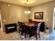 Separate dining area with a wooden table and chairs, suitable for Gathering meals at 8065 Penrose Pl, Wildwood, FL 34785