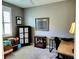 Functional home office with desk, storage, and plenty of natural light at 8065 Penrose Pl, Wildwood, FL 34785