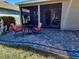 Brick paved patio with seating area at 8065 Penrose Pl, Wildwood, FL 34785