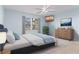 Comfortable bedroom with ample space and a dresser at 9001 Village Green Blvd, Clermont, FL 34711