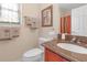 Bathroom with granite vanity and stained glass window at 906 Drakeswood Ave, The Villages, FL 32162