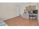 Bedroom with wood floors and home office area at 906 Drakeswood Ave, The Villages, FL 32162