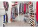 Large walk-in closet with ample shelving and hanging space at 906 Drakeswood Ave, The Villages, FL 32162