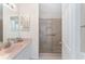 Bathroom boasts a large shower with glass enclosure at 913 Allagash Ave, The Villages, FL 32162