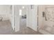 Hallway with carpet, showing access to bedroom and bathroom at 913 Allagash Ave, The Villages, FL 32162