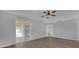 Bedroom with sliding glass doors to patio at 979 Princeton Dr, Clermont, FL 34711