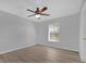 Bright bedroom with ceiling fan and wood flooring at 979 Princeton Dr, Clermont, FL 34711