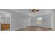 Bedroom with ceiling fan and access to bathroom at 979 Princeton Dr, Clermont, FL 34711