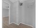 Closet with wire shelving and wood flooring at 979 Princeton Dr, Clermont, FL 34711