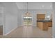 Bright dining area with sliding doors to the backyard at 979 Princeton Dr, Clermont, FL 34711