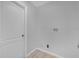Laundry room with hookups and tile flooring at 979 Princeton Dr, Clermont, FL 34711