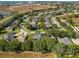 Aerial view of the neighborhood with houses and roads at 979 Princeton Dr, Clermont, FL 34711