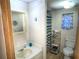 Clean bathroom with shower, toilet and vanity at 1005 Oakland St. St, Tavares, FL 32778