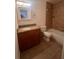 Bathroom boasts granite vanity and tile shower/tub at 1075 S Hiawassee Rd # 911, Orlando, FL 32835