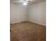 Bright bedroom with tile floors and ceiling fan at 1075 S Hiawassee Rd # 911, Orlando, FL 32835