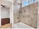 Bathroom featuring a bathtub and shower at 1107 Sugar Loaf Key Loop, Lady Lake, FL 32159