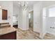 Spa-like bathroom with walk-in shower and tiled flooring at 1107 Sugar Loaf Key Loop, Lady Lake, FL 32159