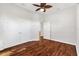 Bedroom featuring hardwood floors and double doors at 1107 Sugar Loaf Key Loop, Lady Lake, FL 32159