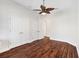 Spacious bedroom with hardwood floors and double closets at 1107 Sugar Loaf Key Loop, Lady Lake, FL 32159