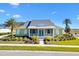 Craftsman style home with front porch and landscaping at 1107 Sugar Loaf Key Loop, Lady Lake, FL 32159