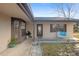 Tan house with brown roof, porch, and walkway at 11146 Pine St, Leesburg, FL 34788