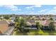 Aerial view of the house and surrounding neighborhood at 1149 Eureka Mill Run, The Villages, FL 32162