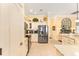 Well-equipped kitchen with granite countertops and stainless steel appliances at 1149 Eureka Mill Run, The Villages, FL 32162