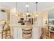 Spacious kitchen featuring granite countertops and stainless steel appliances at 1149 Eureka Mill Run, The Villages, FL 32162