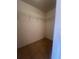 Walk-in closet with wire shelving at 11550 Foxglove Dr, Clermont, FL 34711