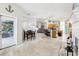 Open concept living room with kitchen and dining area at 1209 Elysium Blvd, Mount Dora, FL 32757