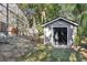 Gray storage shed in backyard at 1209 Elysium Blvd, Mount Dora, FL 32757