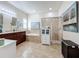 Large bathroom with double sinks, garden tub, and separate shower at 12532 Hammock Pointe Cir, Clermont, FL 34711