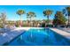 Sparkling community pool with plenty of space for lounging at 12532 Hammock Pointe Cir, Clermont, FL 34711