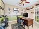 Spacious home office with a large desk and plenty of storage at 12532 Hammock Pointe Cir, Clermont, FL 34711