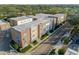 Aerial view showing townhouses and surrounding landscape at 133 S Park Ave, Winter Garden, FL 34787