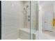 Spacious shower with built-in seat and modern fixtures at 133 S Park Ave, Winter Garden, FL 34787