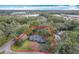 Aerial view of property lines of residence surrounded by lush greenery and a pool at 1701 Cedar Stone Ct, Lake Mary, FL 32746
