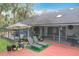 Spacious deck with comfortable lounge chairs and lush landscaping at 1701 Cedar Stone Ct, Lake Mary, FL 32746