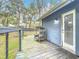 Private deck with seating area and view of backyard at 1701 Cedar Stone Ct, Lake Mary, FL 32746