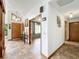 Inviting foyer featuring tile floors, natural lighting, and an open floor plan at 1701 Cedar Stone Ct, Lake Mary, FL 32746