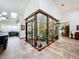 Kitchen featuring indoor atrium, skylights and tile flooring at 1701 Cedar Stone Ct, Lake Mary, FL 32746