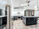 Modern kitchen featuring stainless steel appliances and custom island at 1701 Cedar Stone Ct, Lake Mary, FL 32746