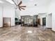 Bright living room featuring high ceilings, tiled floor, and an indoor atrium for a unique touch at 1701 Cedar Stone Ct, Lake Mary, FL 32746