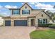 Two-story house with stone and stucco exterior at 17889 Gourd Neck Loop, Winter Garden, FL 34787