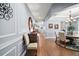 Spacious hallway with wood floors and formal furniture at 17889 Gourd Neck Loop, Winter Garden, FL 34787