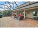 Outdoor patio with seating area and fire pit at 17889 Gourd Neck Loop, Winter Garden, FL 34787